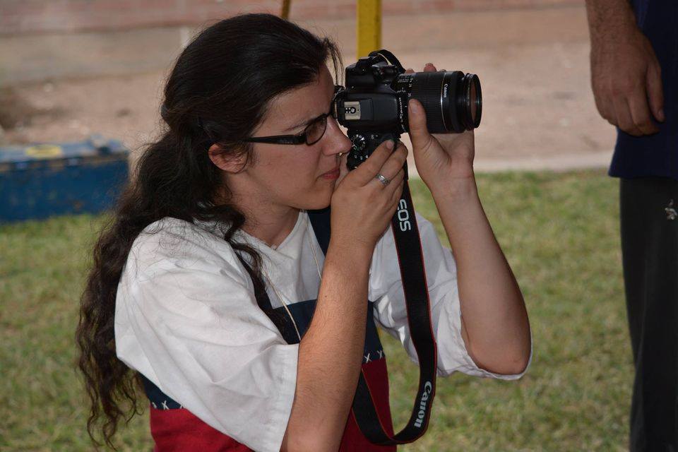 Mistress Sigrid snapping photos. Media photo